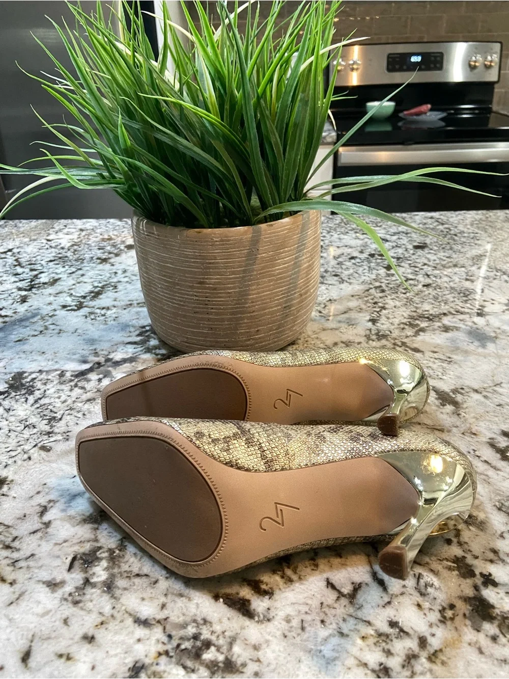 27 EDIT snake print heels
